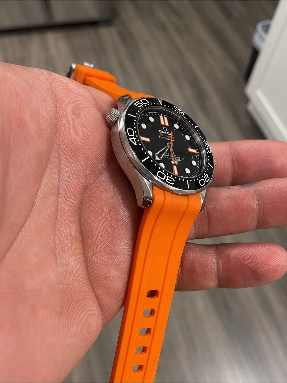 Omega Men's Swim Watch with Orange Strap and Black Dial
